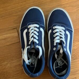 Size 4 blue low top vans with checkered side soles. Like new worn twice